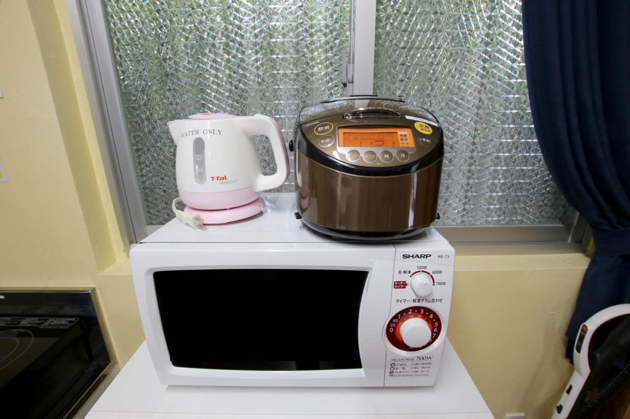 Guest House Sato Motobu Exterior foto